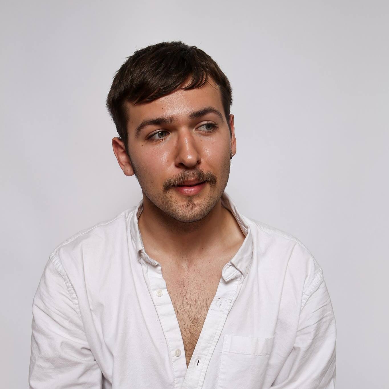 A headshot of Samuel